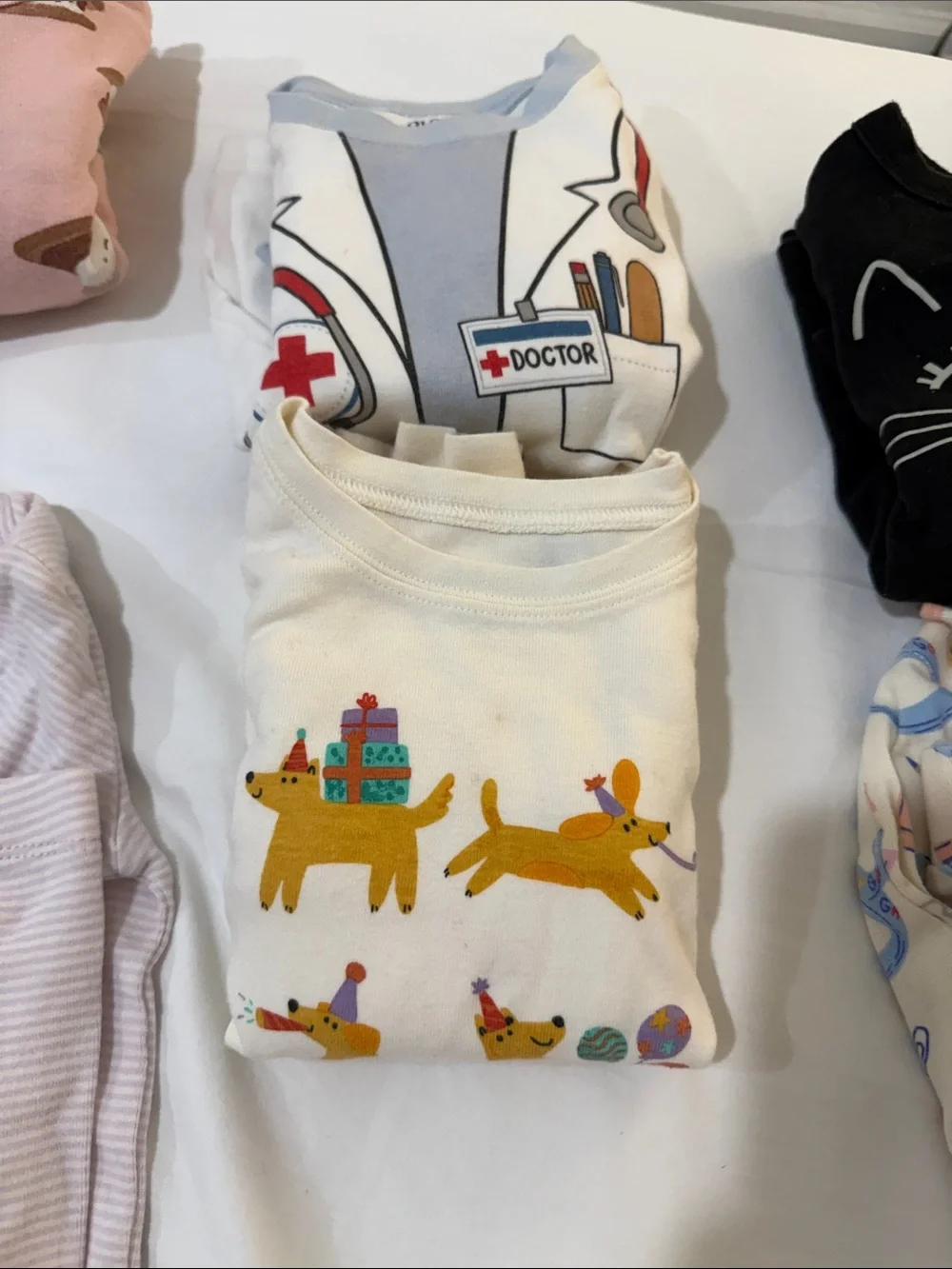 Lot of PJ sets from Gap, Carters and old Navy.  Mostly long sleeve and pants